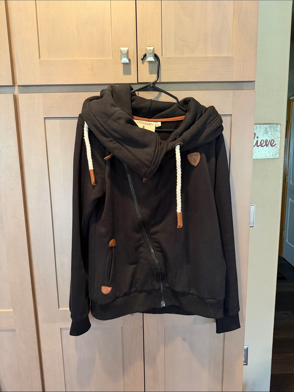 Wanakome Black Hoodie Jacket with White Drawstrings and Brown Trim